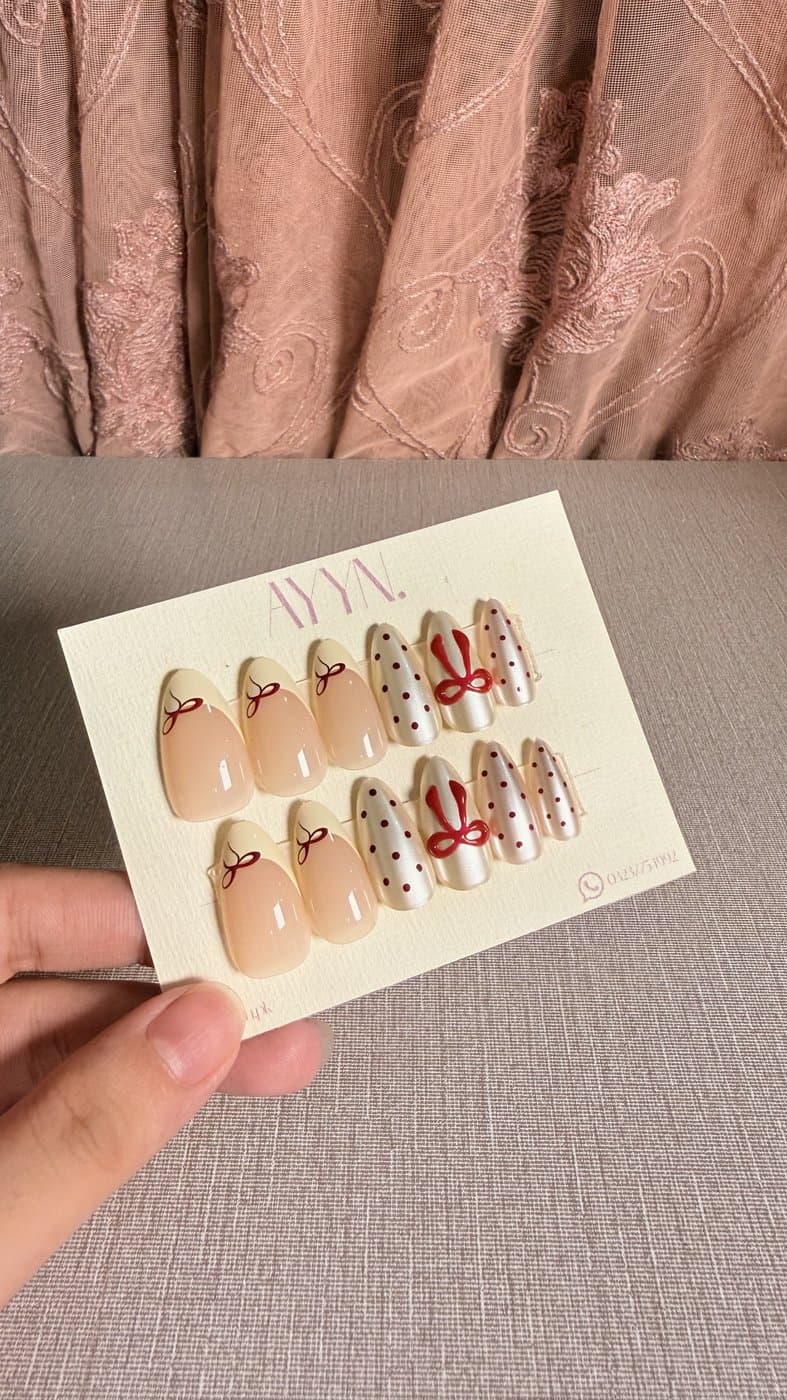 Coquette Bow press-on nails by AYYN.